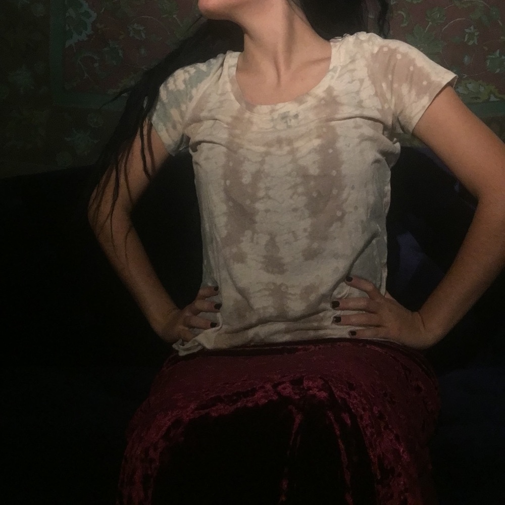 Worn in pastel tie-dye t-shirt